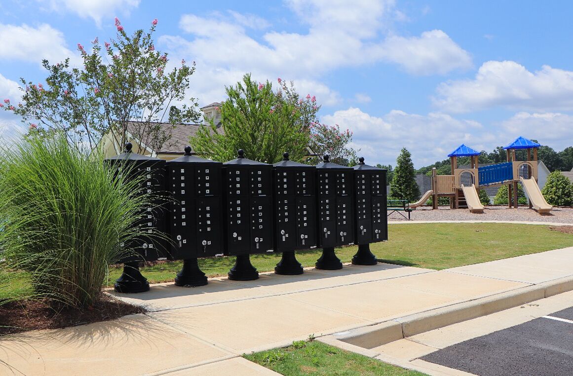 Black CBUs with vogue accessories installed near community rec center playground